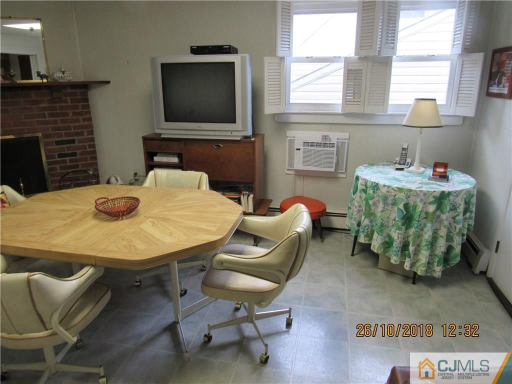 21 Halstead Road New Brunswick, NJ 08901 - Photo 10 of 22 a dining room with furniture and window