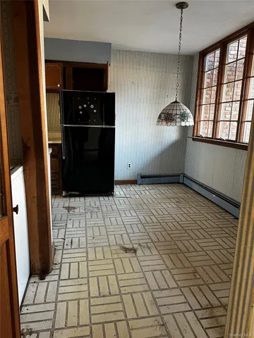a kitchen with stainless steel appliances granite countertop a sink and a stove