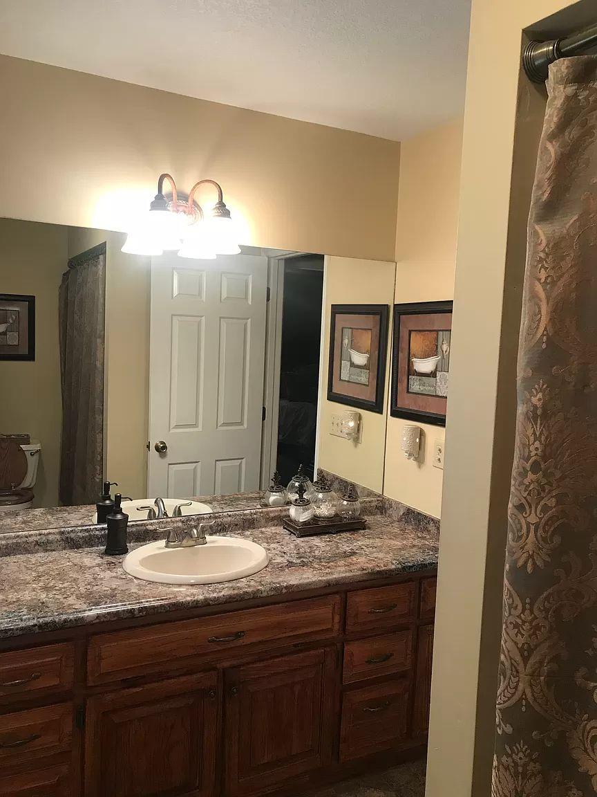 1701 Carter Road Decherd, TN 37324 - Photo 11 of 25 Beautiful cabinet sink in the main bath.