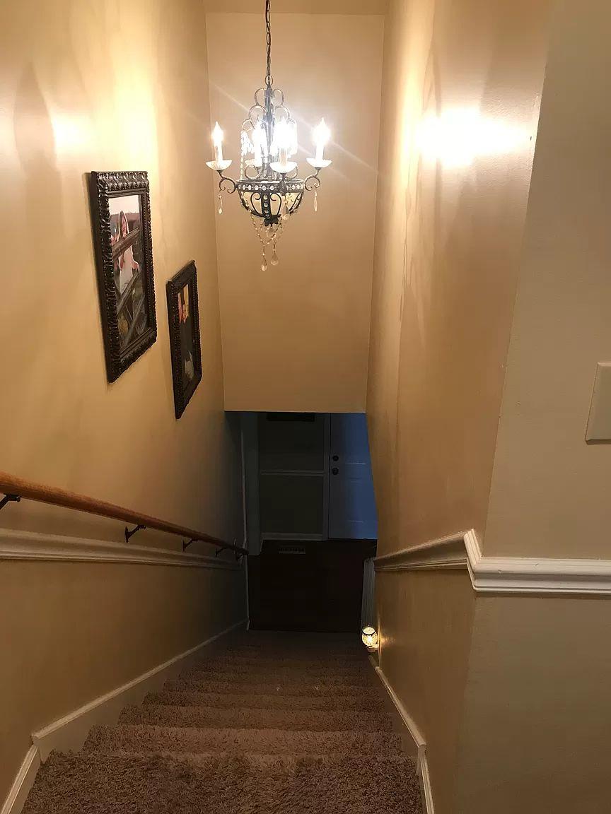 1701 Carter Road Decherd, TN 37324 - Photo 13 of 25 Beautiful staircase with chair rail on the walls going up.
