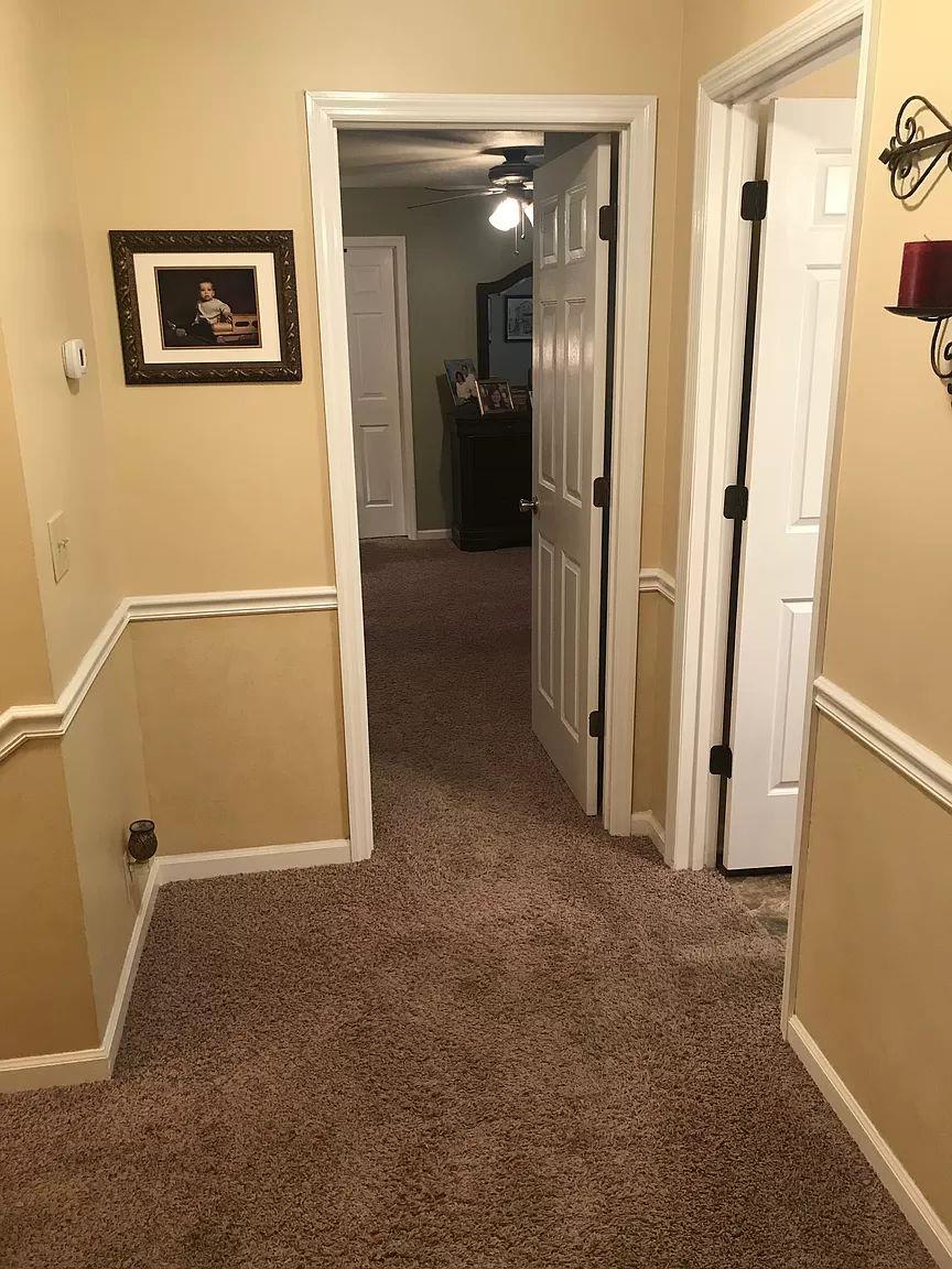 1701 Carter Road Decherd, TN 37324 - Photo 14 of 25 This hallway leads to the 3 bedrooms upstairs.