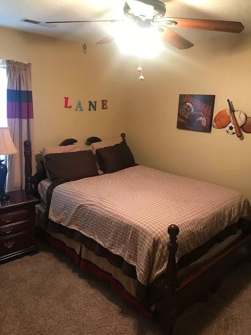 1701 Carter Road Decherd, TN 37324 - Photo 15 of 25 This is the 11x11 bedroom 2. Large rooms throughout the home.