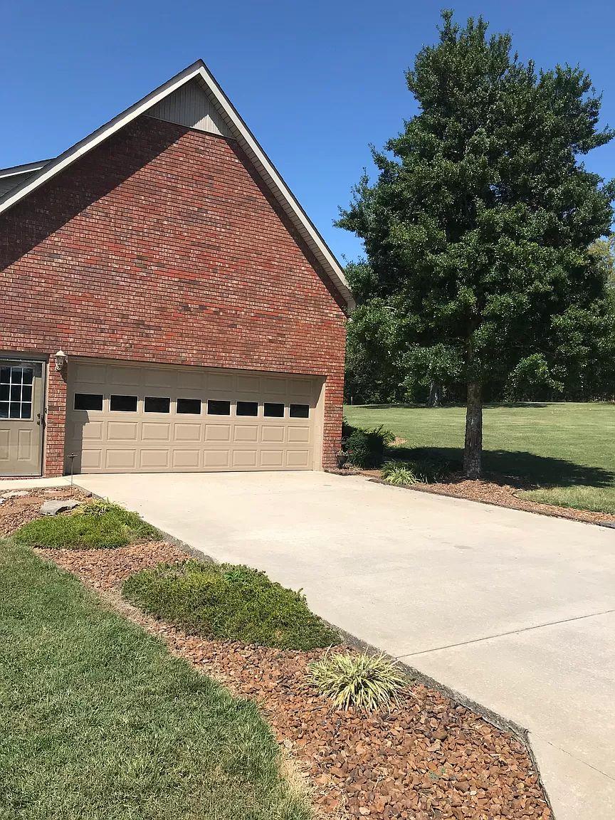 1701 Carter Road Decherd, TN 37324 - Photo 22 of 25 There is an oversize 2 car garage on the side.