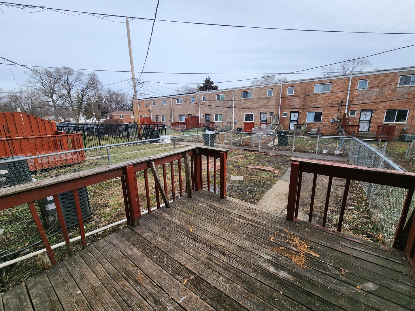 2211 171st Street Hazel Crest, IL 60429 - Photo 12 of 12 a view of a balcony with wooden floor and outdoor seating