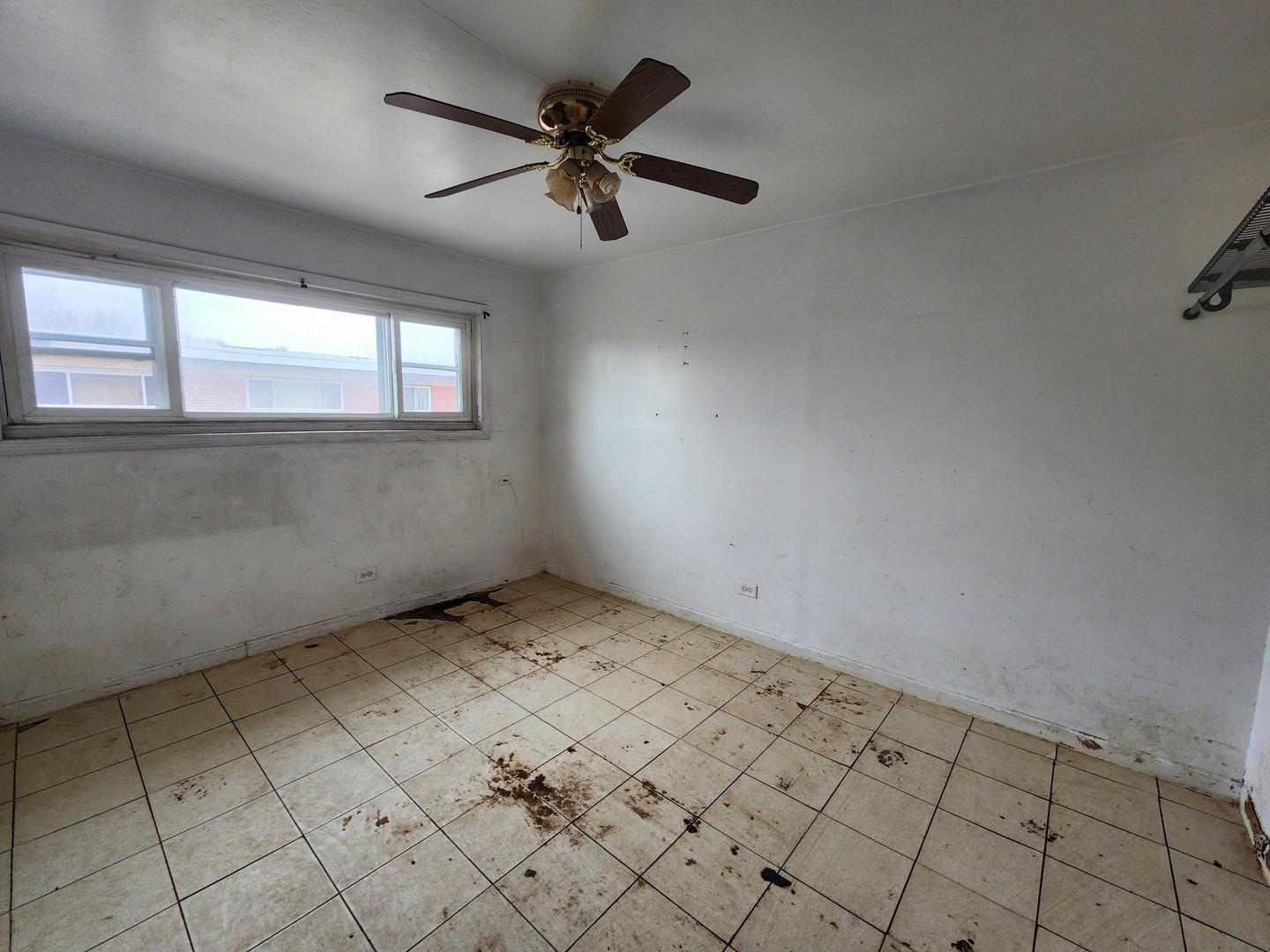 2211 171st Street Hazel Crest, IL 60429 - Photo 6 of 12 an empty room with windows