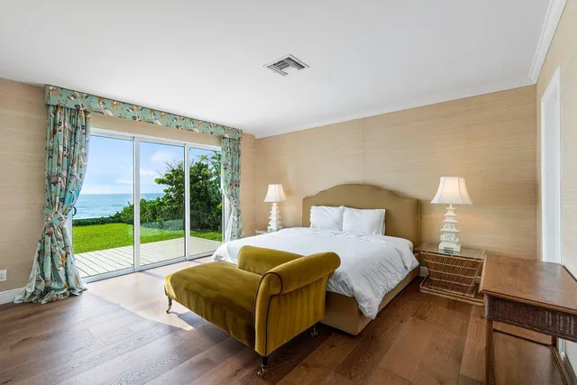 a bedroom with a bed and a view of bedroom