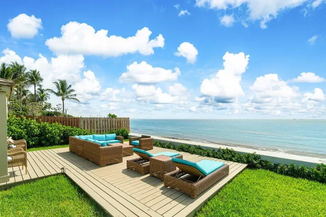 a view of a deck with furniture