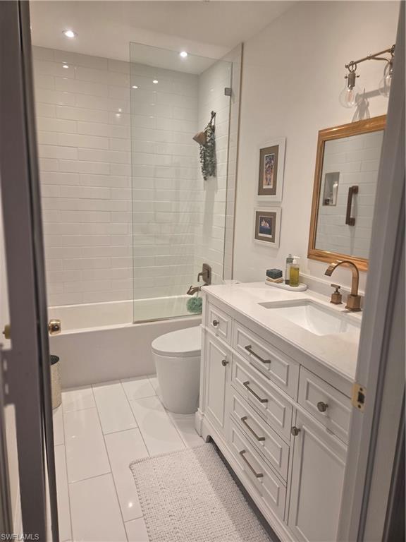 3531 County Barn Road, Unit C201 Naples, FL 34112 - Photo 16 of 20 Full bathroom with shower / bath combination, vanity, light tile patterned floors, and recessed lighting