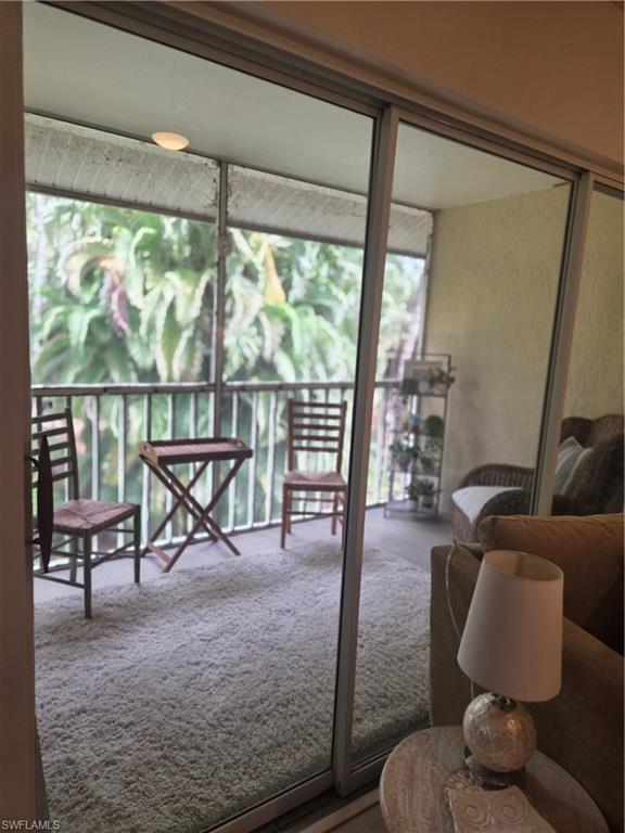 3531 County Barn Road, Unit C201 Naples, FL 34112 - Photo 7 of 20 View of sunroom / solarium