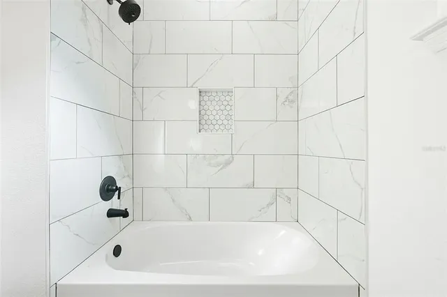 a bathroom with a bathtub