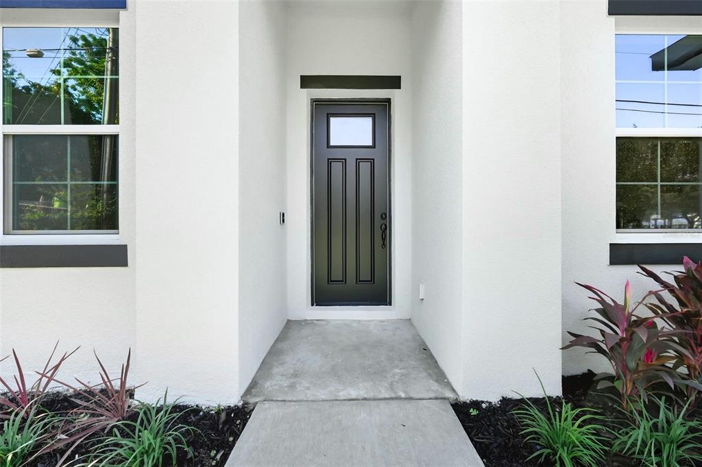 115 Leon Street Altamonte Springs, FL 32701 - Photo 2 of 15 a view of a house with a small yard