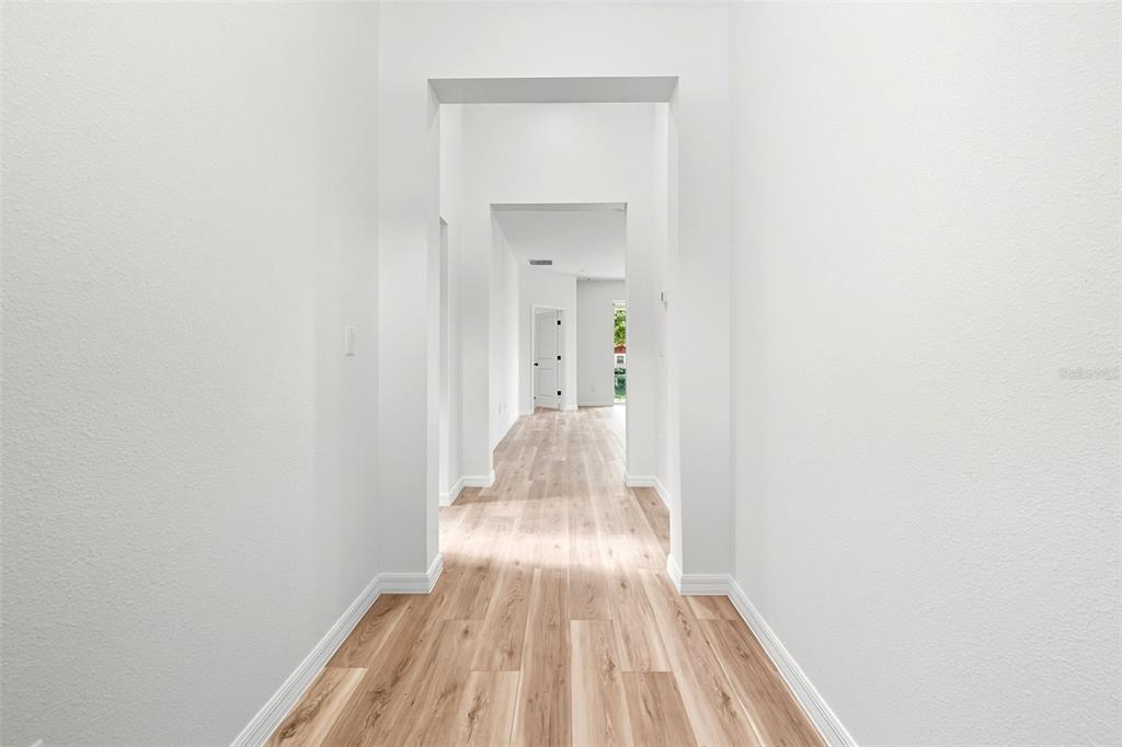 115 Leon Street Altamonte Springs, FL 32701 - Photo 3 of 15 a view of a bedroom with wooden floor