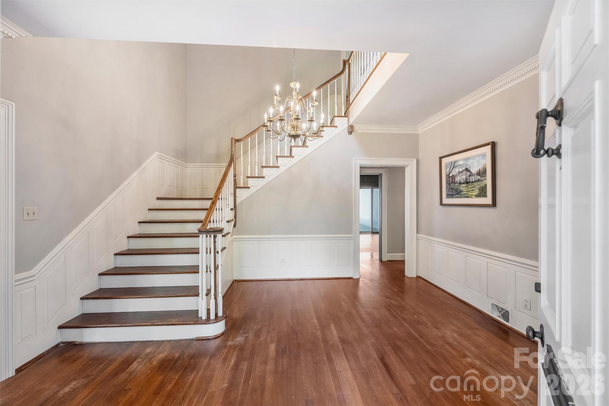 812 Ardsley Road Charlotte, NC 28207 - Photo 11 of 44 a view of entryway and hall with wooden floor