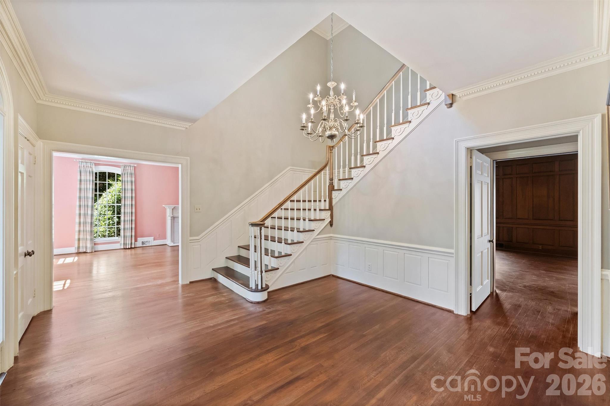 812 Ardsley Road Charlotte, NC 28207 - Photo 12 of 44 wooden floor in an empty room with a window and wooden floor
