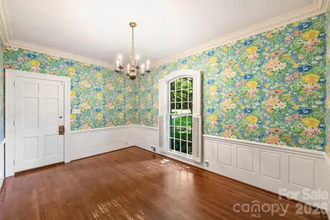 a view of livingroom with window and hardwood floor