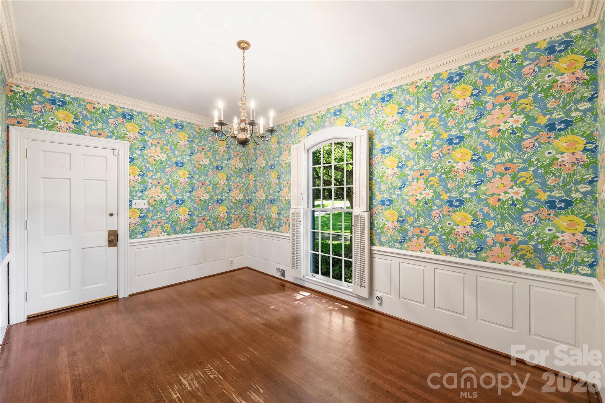 812 Ardsley Road Charlotte, NC 28207 - Photo 23 of 44 a view of livingroom with window and hardwood floor