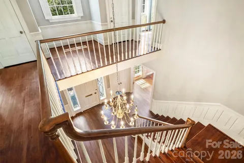 a view of an entryway with wooden floor