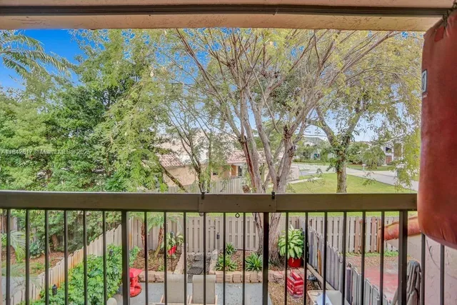 a view of a balcony with an outdoor space