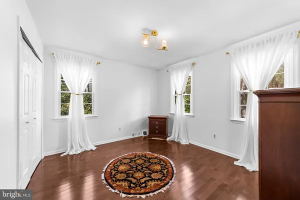 a view of a livingroom with furniture and window