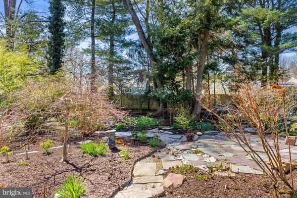 a view of a backyard of the house