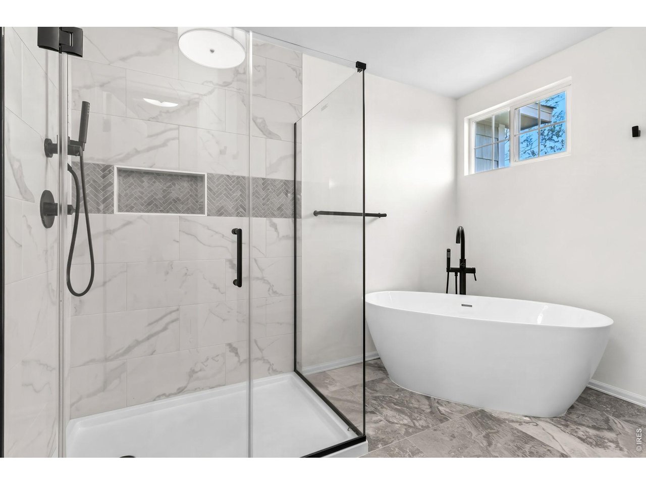 2521 Azalea Way Erie, CO 80516 - Photo 24 of 47 Newly remodeled primary bathroom with separate walk in shower and soaking tub
