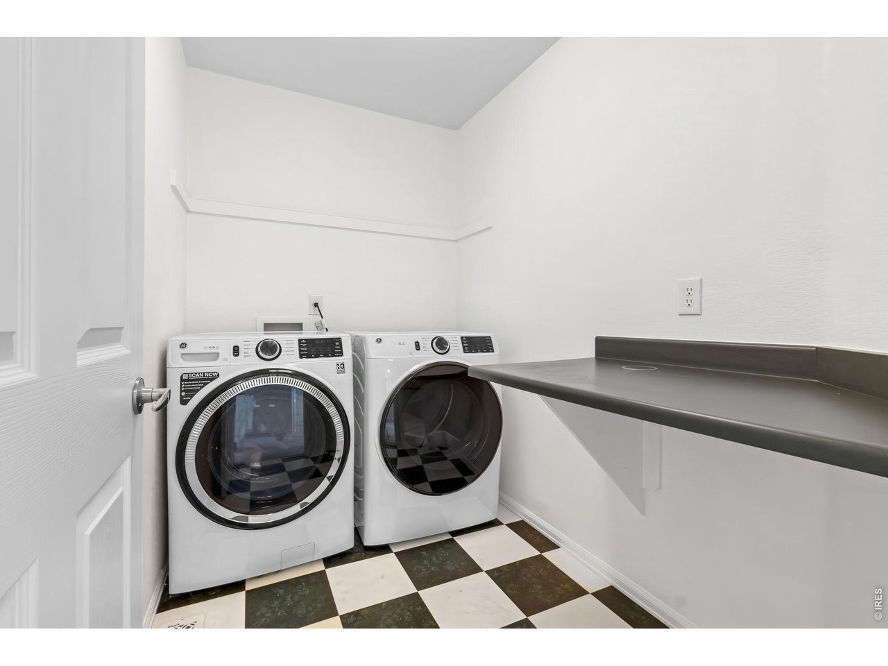 2521 Azalea Way Erie, CO 80516 - Photo 27 of 47 The laundry room is conveniently located on the upper level