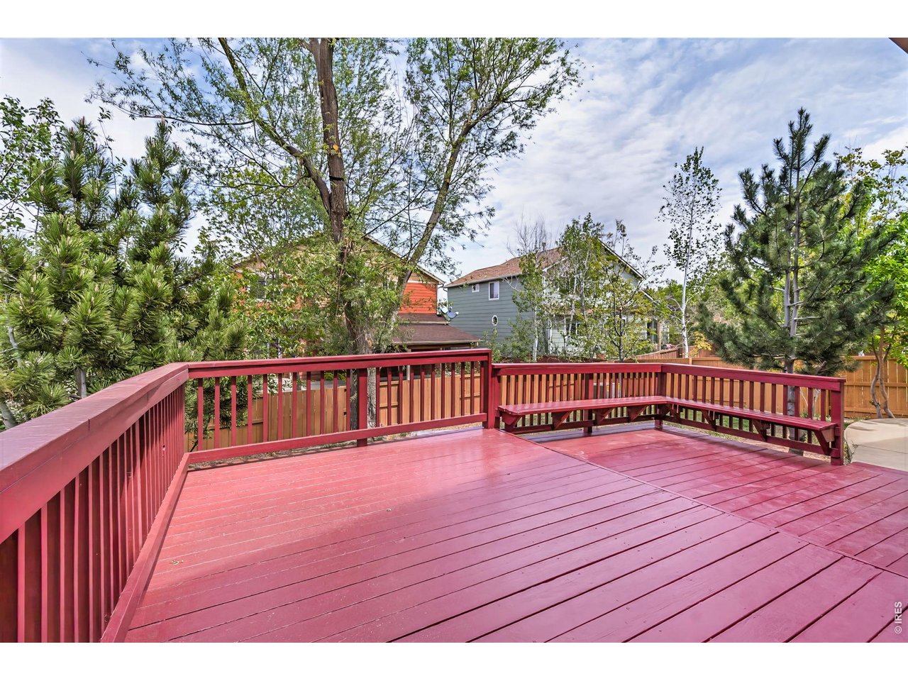 2521 Azalea Way Erie, CO 80516 - Photo 37 of 47 Freshly repainted back deck with access through sliding glass doors off the kitchen