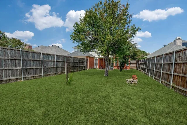 a view of a backyard with a garden