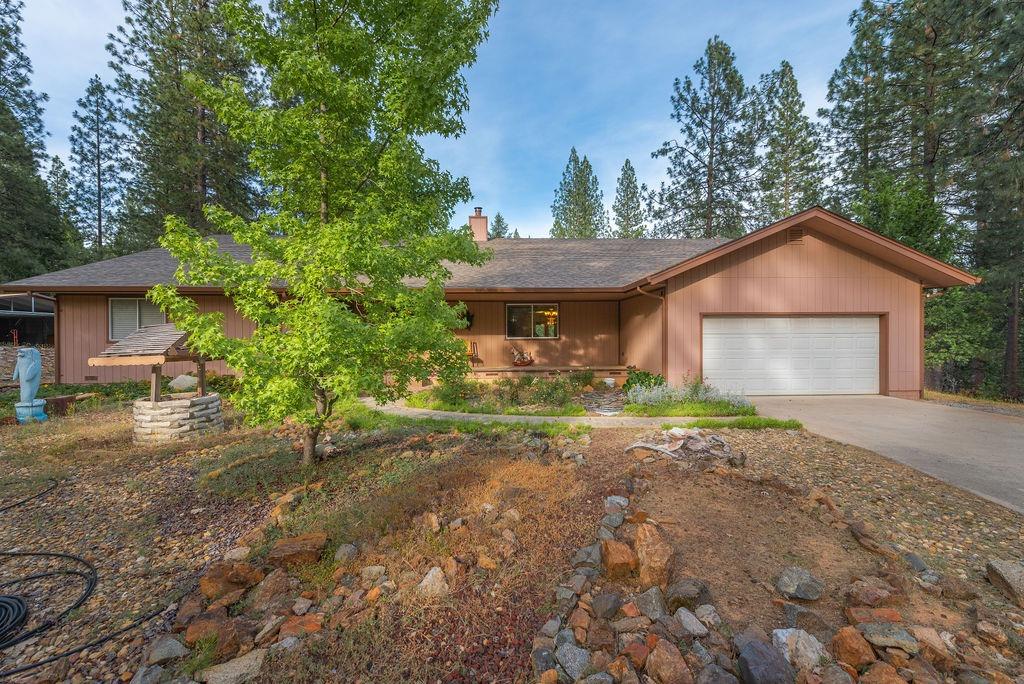 2292 Lily Gap Road West Point, CA 95255 - Photo 1 of 1 a view of a house with a yard and large tree