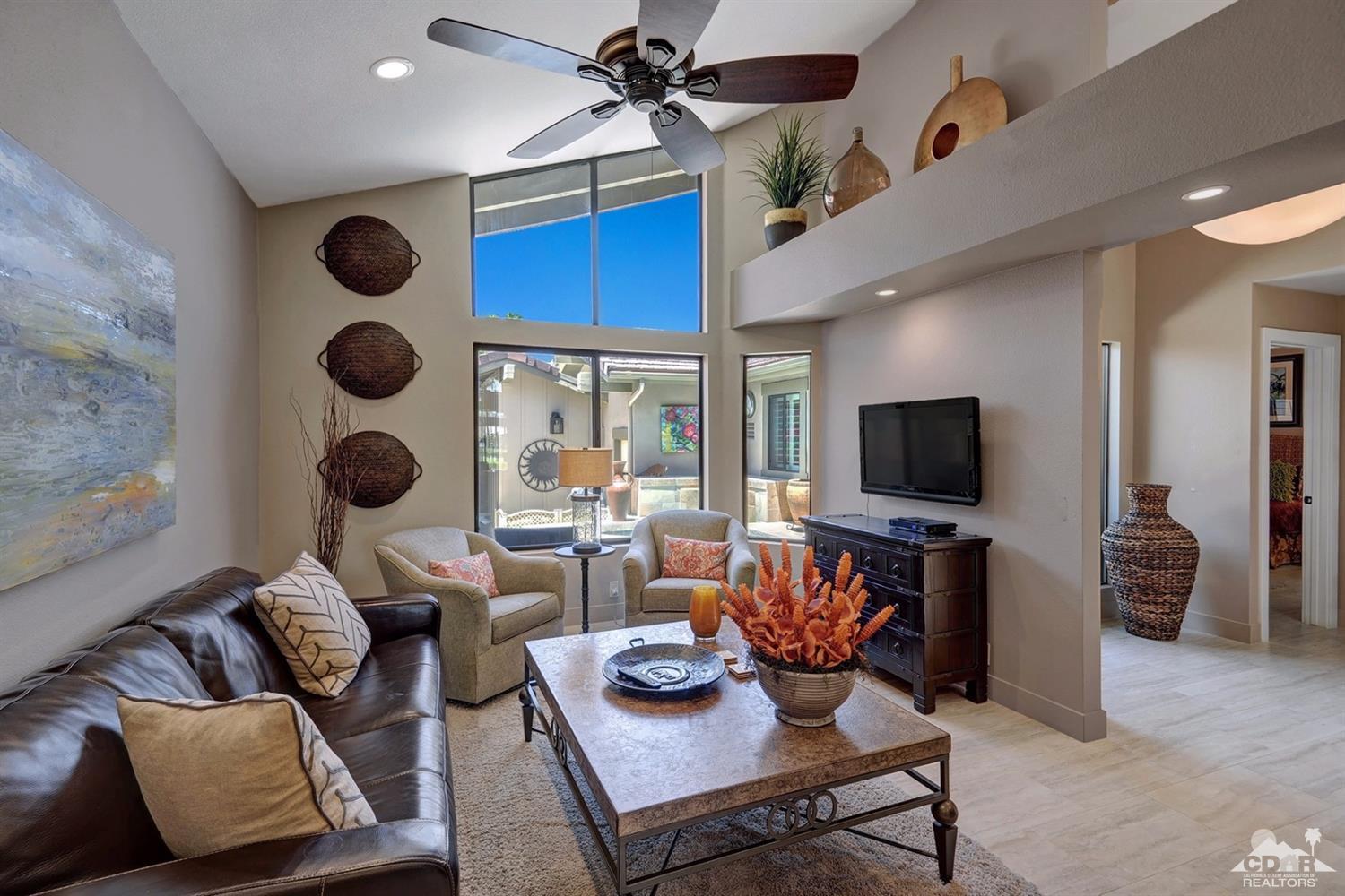 395 Red River Road Palm Desert, CA 92211 - Photo 11 of 29 a living room with furniture and wooden floor