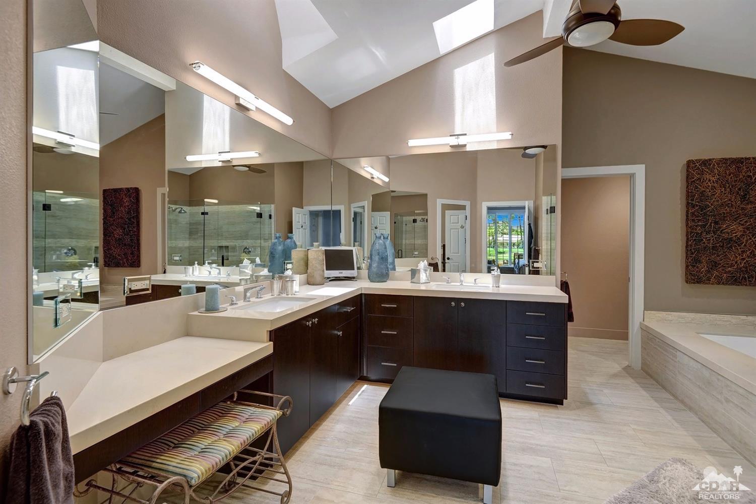 395 Red River Road Palm Desert, CA 92211 - Photo 17 of 29 a large kitchen with a table and chairs
