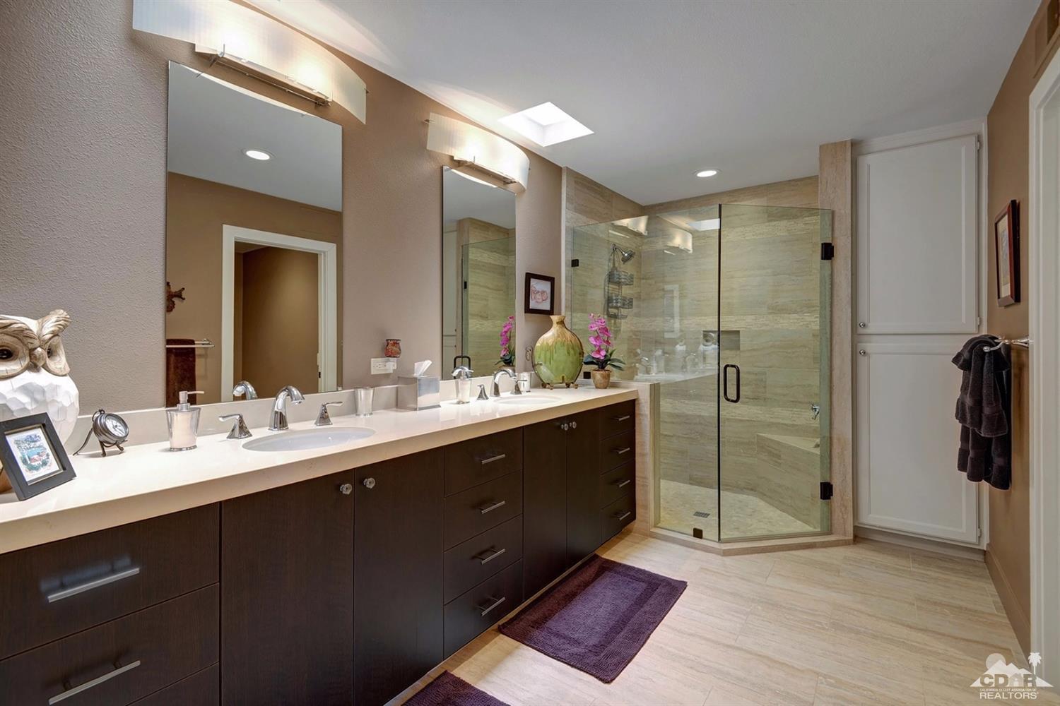 395 Red River Road Palm Desert, CA 92211 - Photo 21 of 29 a bathroom with a double vanity sink mirror and shower