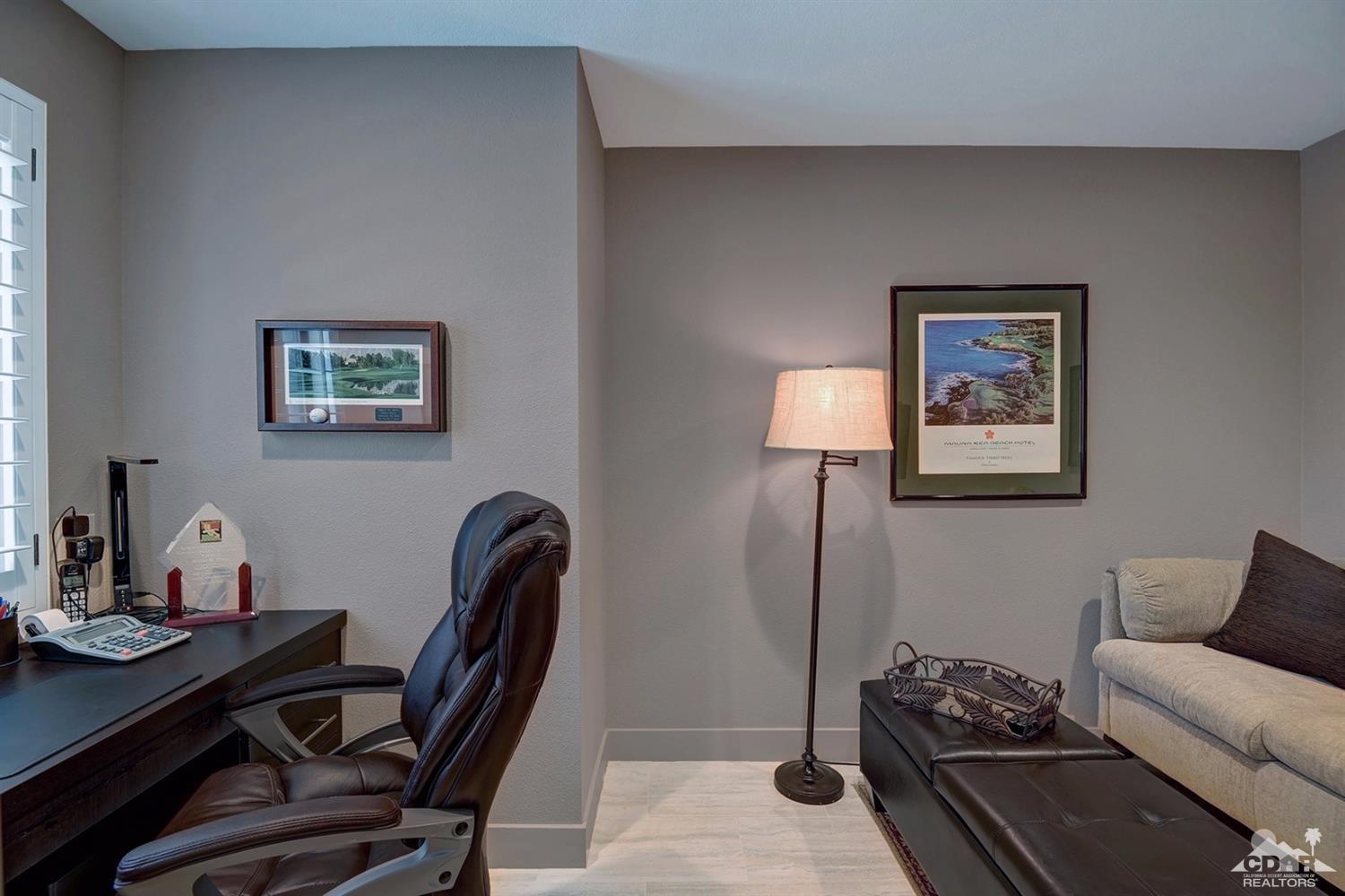 395 Red River Road Palm Desert, CA 92211 - Photo 22 of 29 a view of a workspace with furniture and a window