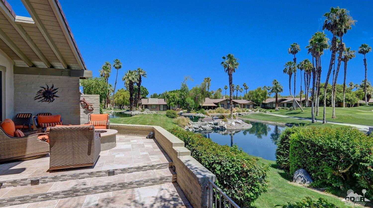 395 Red River Road Palm Desert, CA 92211 - Photo 26 of 29 a view of a water pond with an outdoor seating
