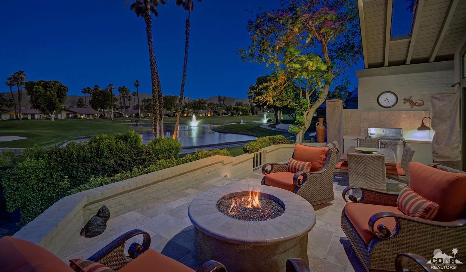 395 Red River Road Palm Desert, CA 92211 - Photo 3 of 29 a outdoor living space with furniture and city view