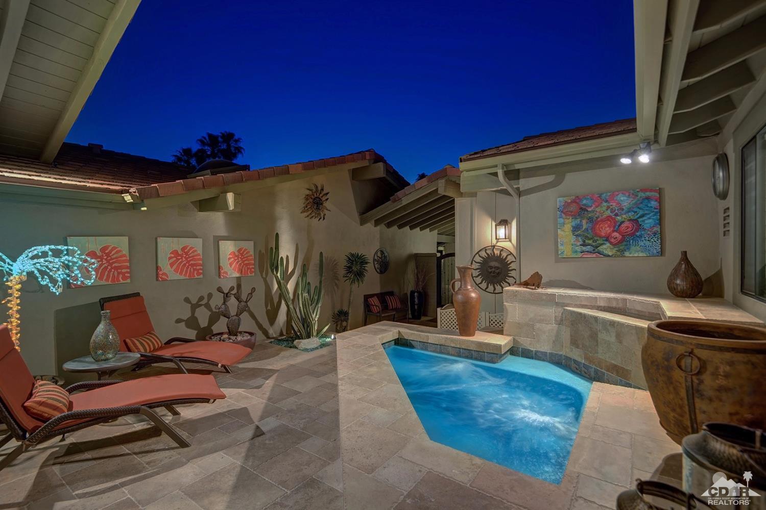395 Red River Road Palm Desert, CA 92211 - Photo 5 of 29 a view of a chairs and tables in patio