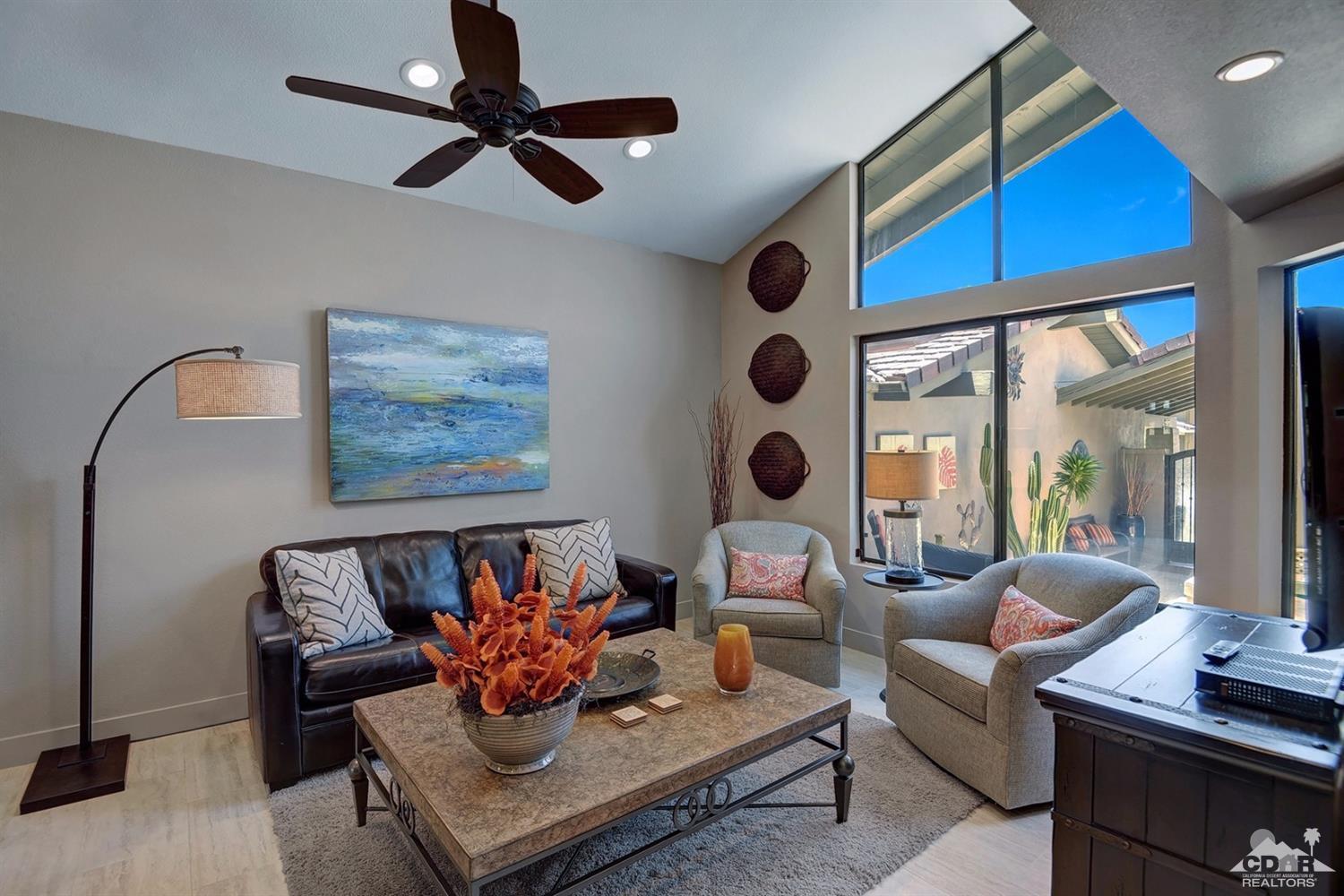 395 Red River Road Palm Desert, CA 92211 - Photo 10 of 29 a living room with furniture and a window