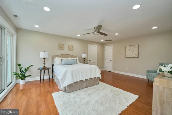 a kitchen with stainless steel appliances granite countertop a sink a stove top oven a counter space and cabinets
