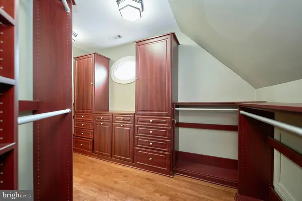 a front view of a house with a yard table and chairs