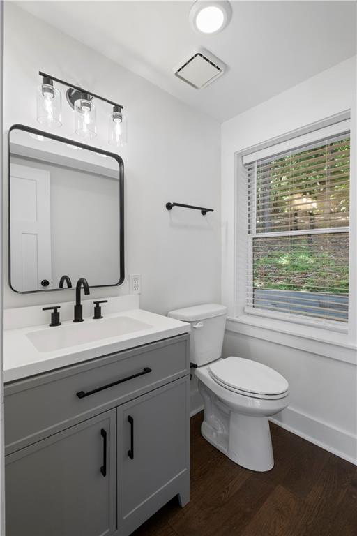 62 Bear Cub Ridge Big Canoe, GA 30143 - Photo 17 of 39 a bathroom with a toilet a sink and mirror
