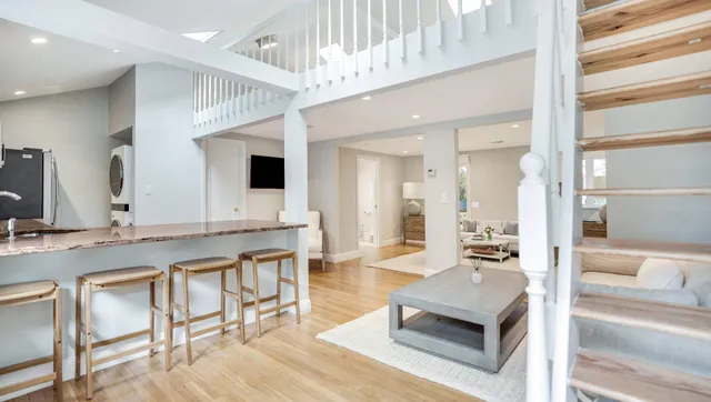 a large living room with a large window