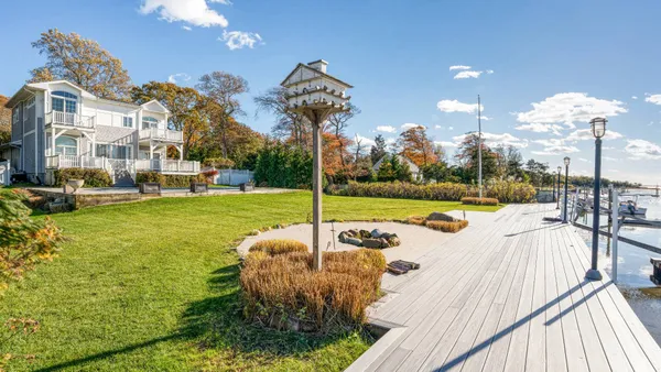 a view of a house with a swimming pool