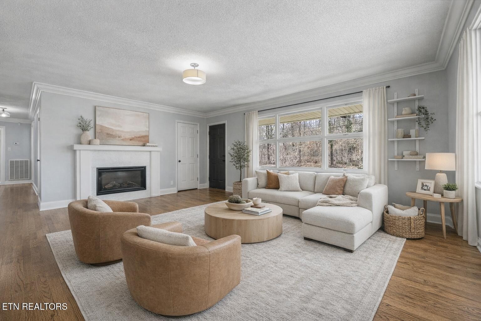 209 Wakefield Road Knoxville, TN 37922 - Photo 11 of 29 a living room with furniture and a fireplace
