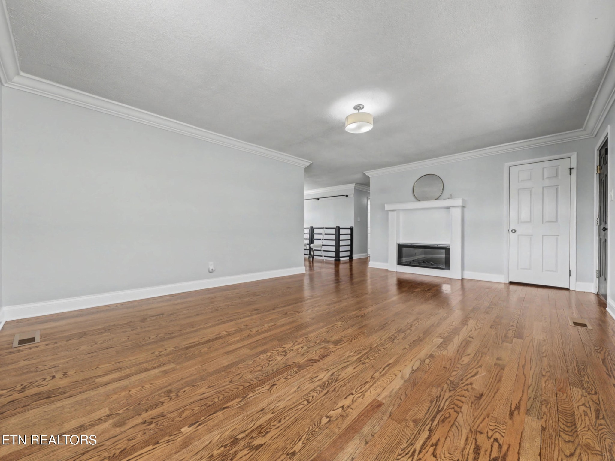 209 Wakefield Road Knoxville, TN 37922 - Photo 12 of 29 a view of empty room with wooden floor