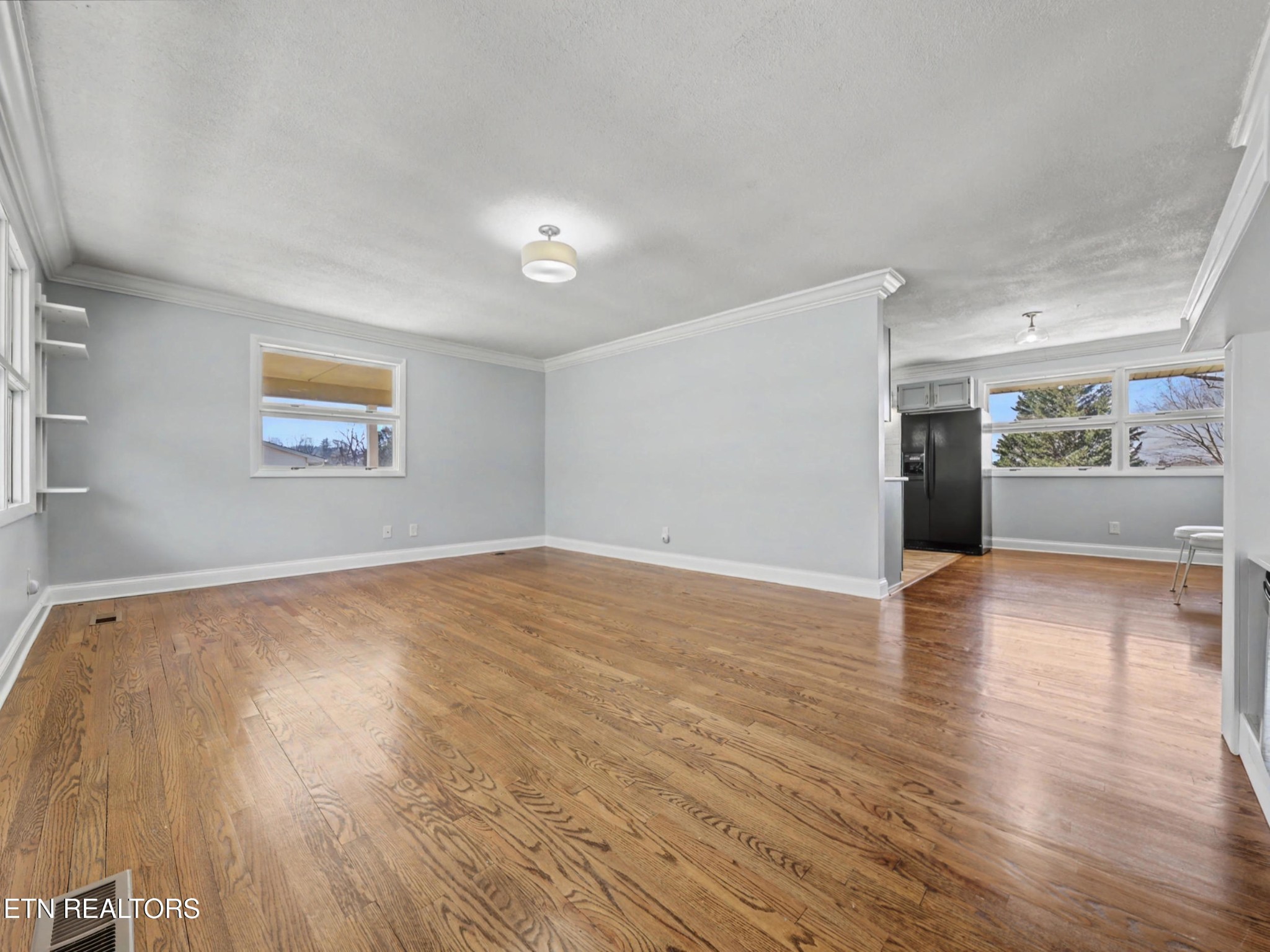 209 Wakefield Road Knoxville, TN 37922 - Photo 14 of 29 a view of empty room with wooden floor