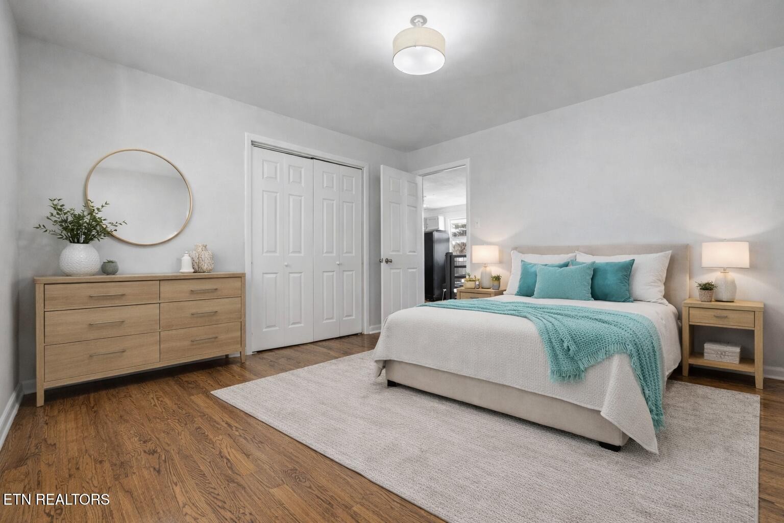 209 Wakefield Road Knoxville, TN 37922 - Photo 20 of 29 a bedroom with a bed and cabinets