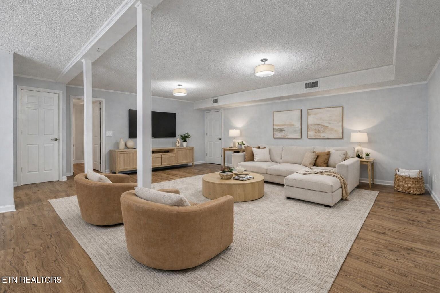 209 Wakefield Road Knoxville, TN 37922 - Photo 24 of 29 a living room with fireplace furniture and a flat screen tv