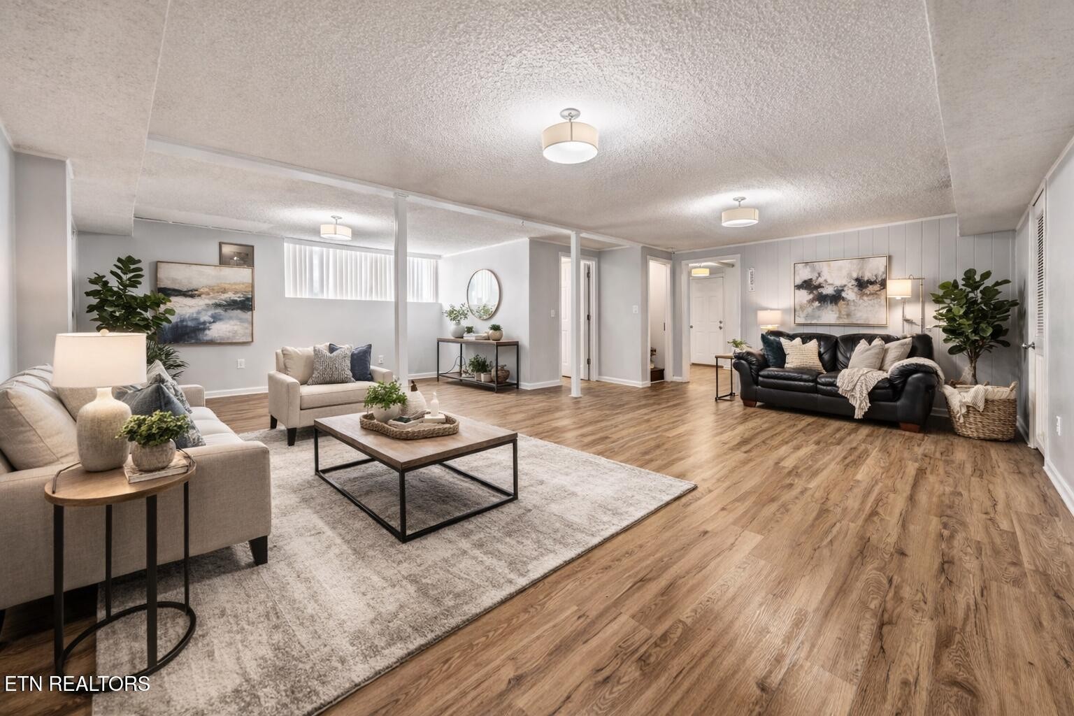 209 Wakefield Road Knoxville, TN 37922 - Photo 25 of 29 a living room with furniture and a wooden floor
