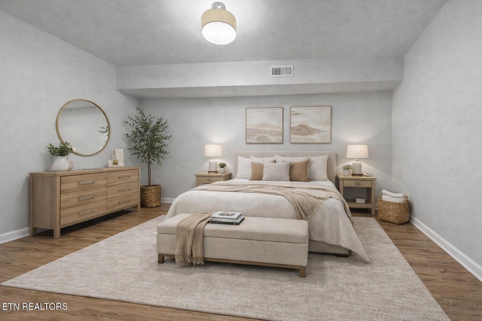 209 Wakefield Road Knoxville, TN 37922 - Photo 26 of 29 a bedroom with a bed a mirror and lamp