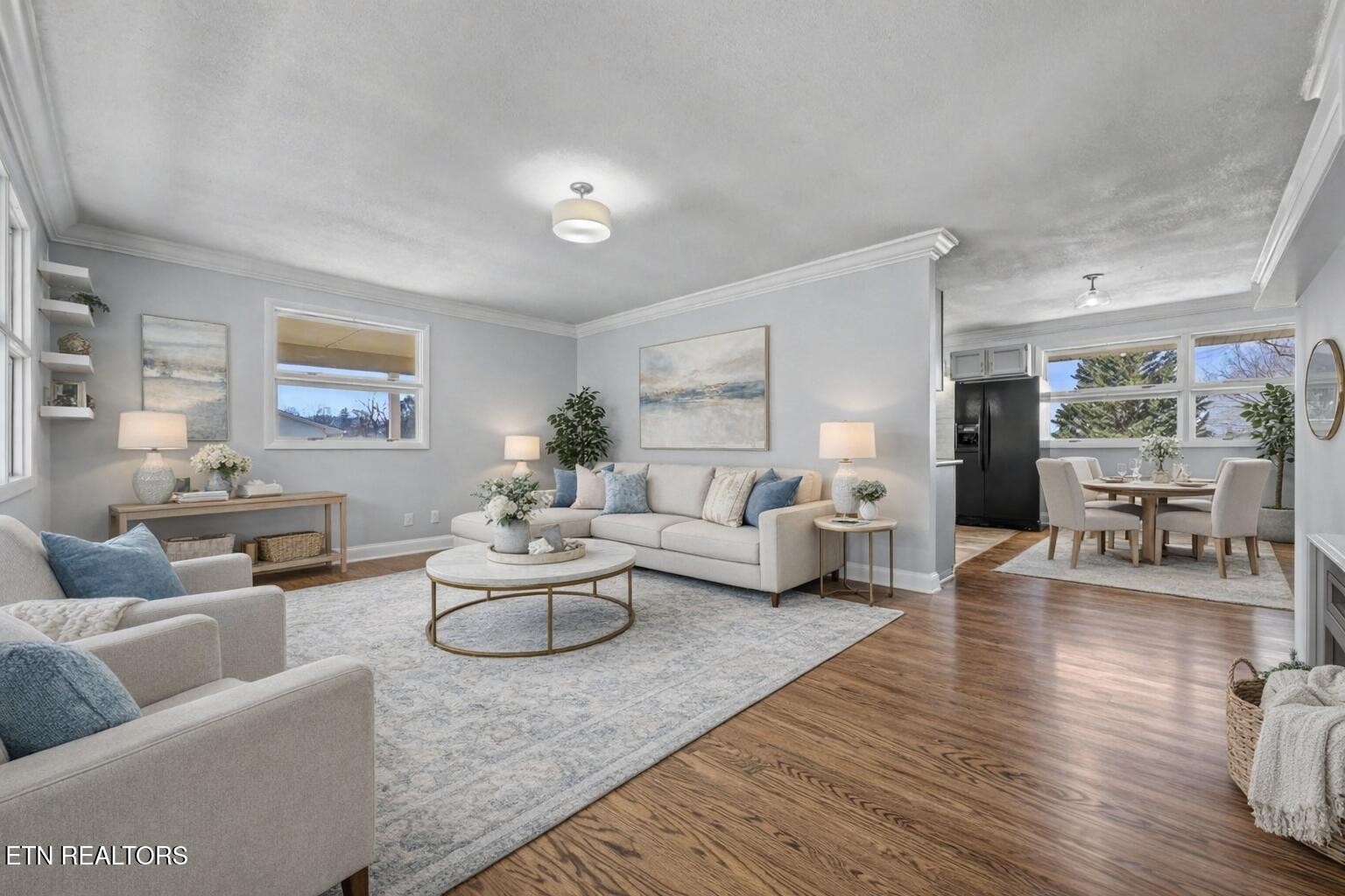 209 Wakefield Road Knoxville, TN 37922 - Photo 10 of 29 a living room with furniture and wooden floor